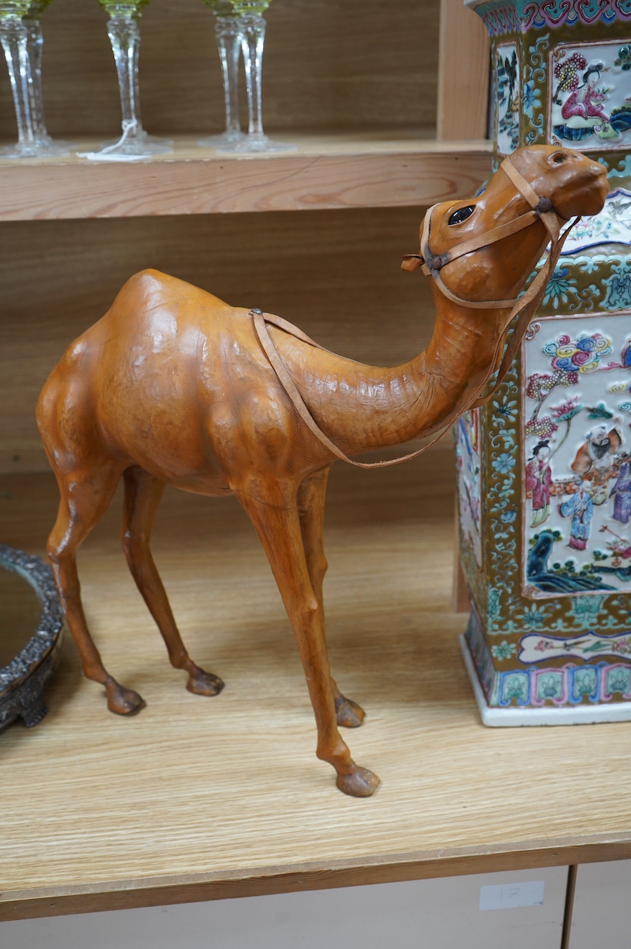 A Liberty style finely modelled brown leather Camel in the manner of Omersa, 49cm high. Condition - good